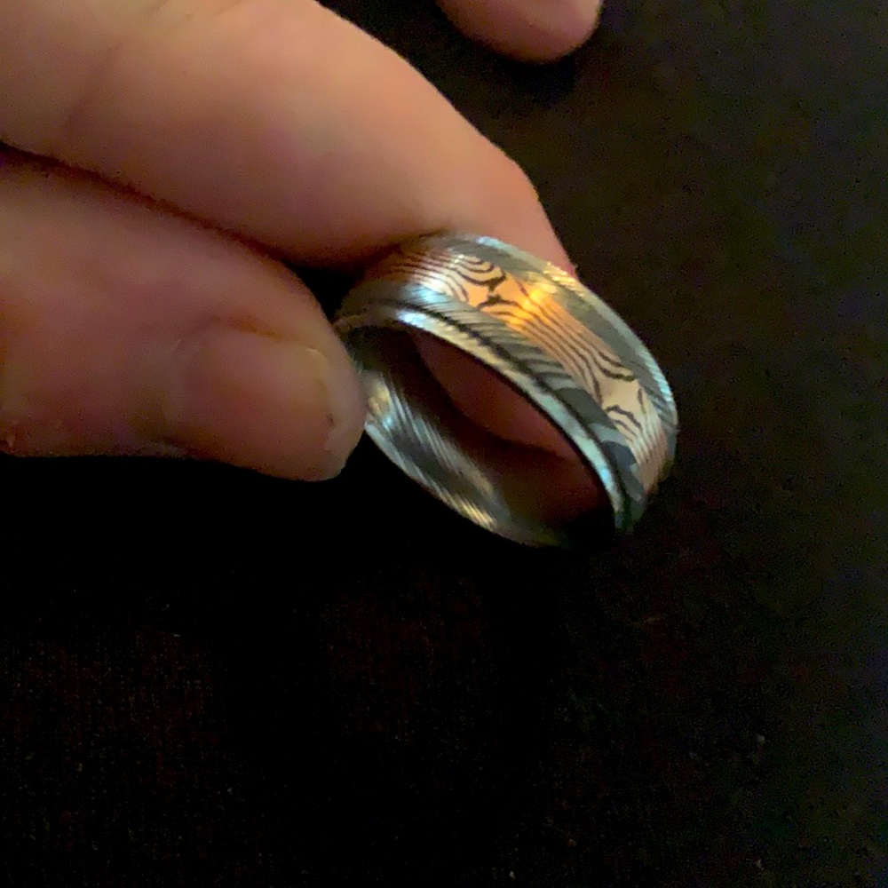 Shane company damascus steel with 14K rose gold accent. Size 10
